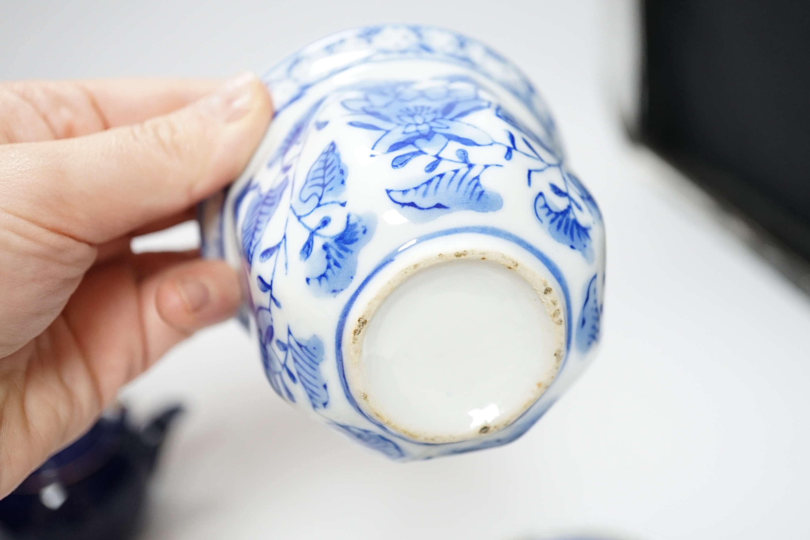 A Chinese cinnabar lacquer jar and cover, a Chinese copper red bottle vase, a carved wood figure, a Meissen miniature bowl and other ceramics, jar 15cm